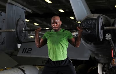 A weight lifter getting stronger